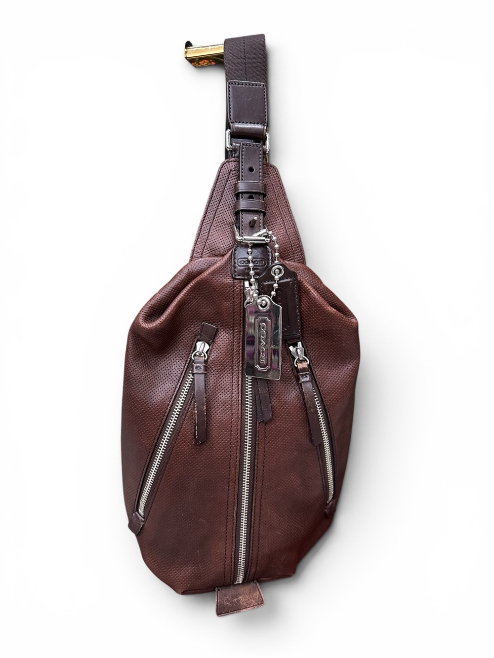 Coach Hudson 70716 Brown Perforated Leather Sling Pack Crossbody Backpack